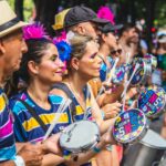 Colorful drum performance during a lively street parade in Belo Horizonte, Brazil.